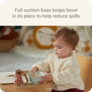 child eating from suction bowl image number 2
