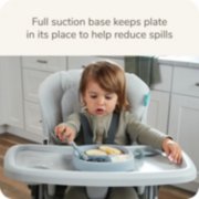 child eating from suction plate image number 2