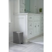 small step on wastebasket in kitchen image number 6