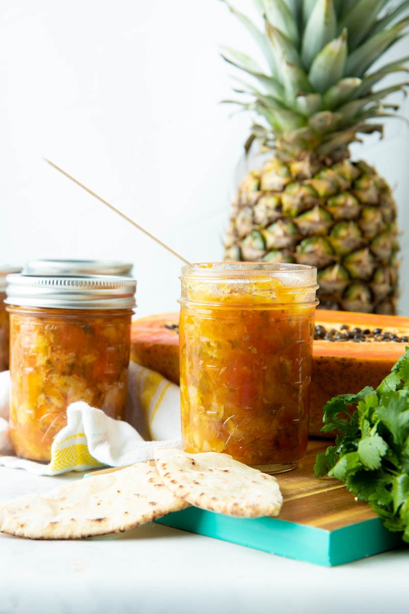 jars of salsa with papaya and pineapple
