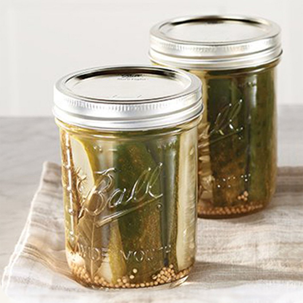 Canned food in mason jars on kitchen counter