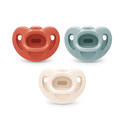 Three pacifiers in various colors