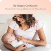 Baby using pacifier image number 5