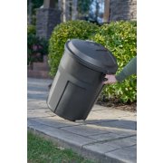man wheeling outdoor refuse bin image number 5