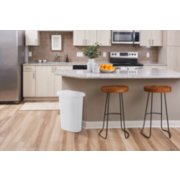 white swing top waste bin in kitchen image number 6