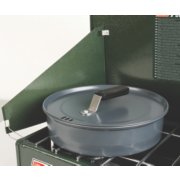 Pot above burner of green propane stove image number 5