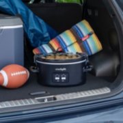 slow cooker with food in car trunk image number 7