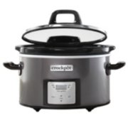 a slow cooker with lid partial open image number 1