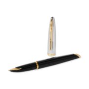 A Carene fountain pen with gold trim laid next to a pen cap stood upright. image number 4