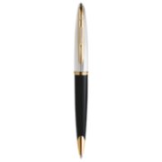 A Carene ballpoint pen with gold trim stood upright with pen tip pointing down. image number 1