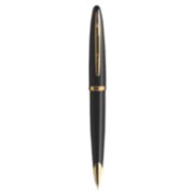 A Carene ballpoint pen with gold trim stood upright with pen tip pointing down. image number 1