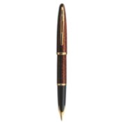 A Carene fountain pen with gold trim stood upright with nib pointing down. image number 1