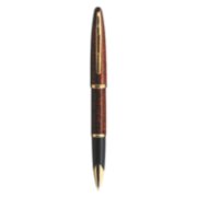 A Carene rollerball pen with gold tirm stood upright with pen tip pointing down. image number 1