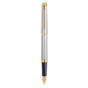 A Hemisphere fountain pen with gold trim stood upright with nib pointing down. image number 1