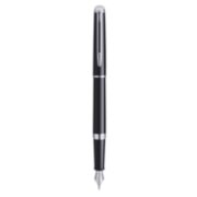 A Hemisphere fountain pen with chrome trim stood upright with nib pointing down. image number 1