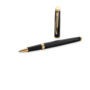 A Hemisphere rollerball pen with gold trim laid next to an upright pen cap. image number 4