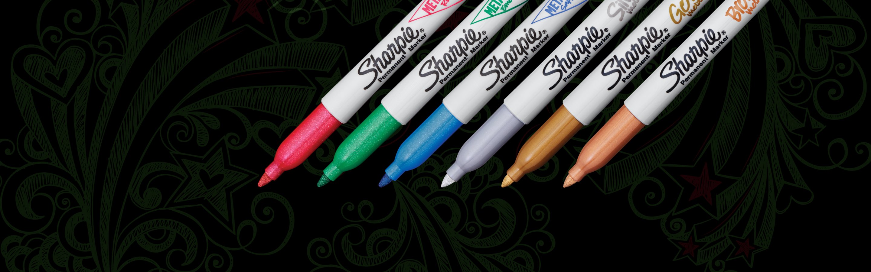 Assorted metallic markers