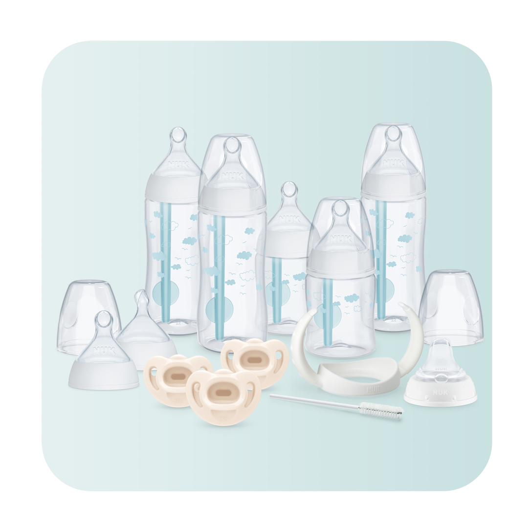 Set of five baby bottles, with accessories.