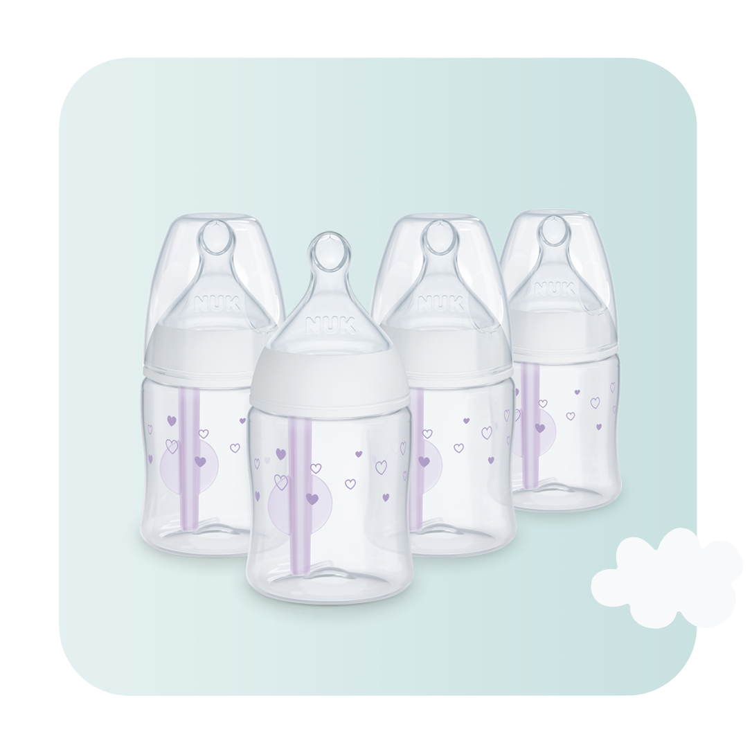 Set of four baby bottles