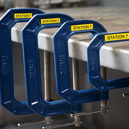 Four clamps of different sizes with yellow labels that read Station 7.