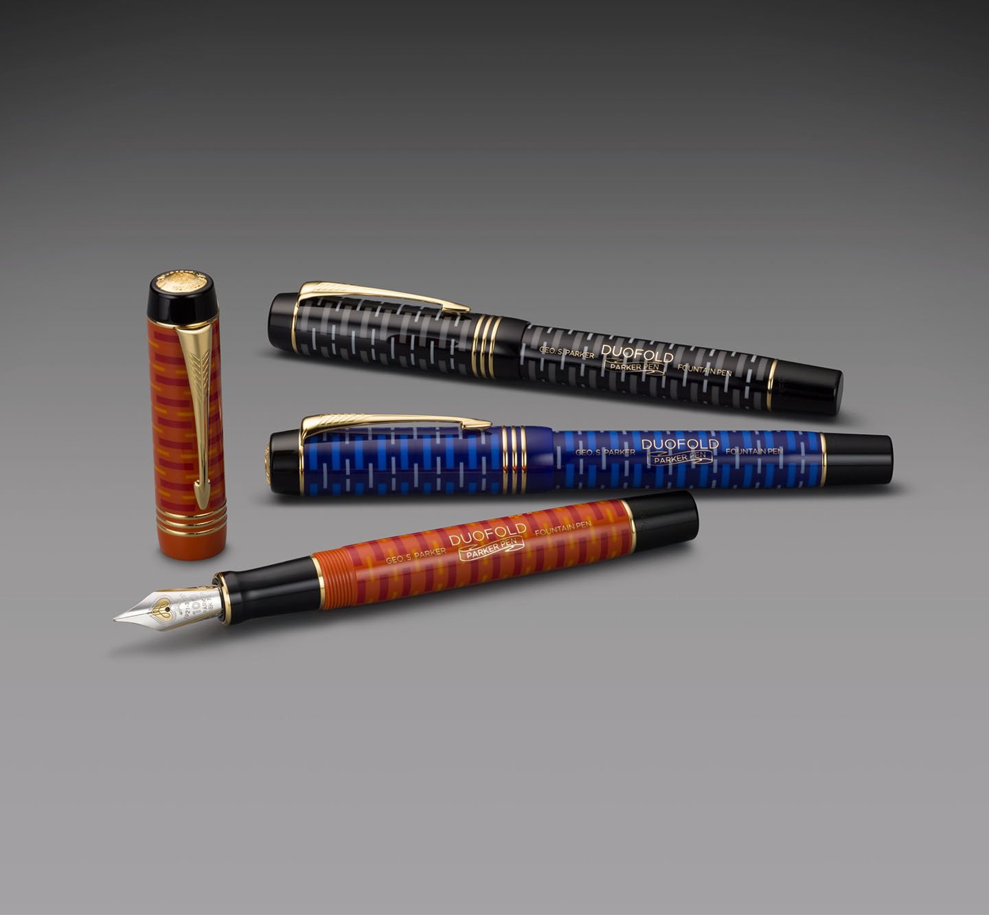 Three Duofold Limited Edition fountain pens.