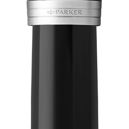 Closeup of a Parker 51 barrel and pen cap with chrome trim showcasing an engraved Parker logo.