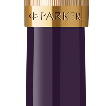 Closeup of a Parker 51 barrel and pen cap with gold trim showcasing an engraved Parker logo.