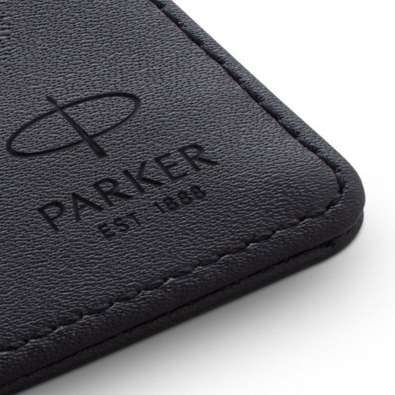 Closeup of the embossed Parker logo on a card holder.