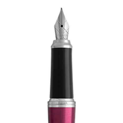 Closeup of an Urban fountain pen nib and barrel with chrome trim.