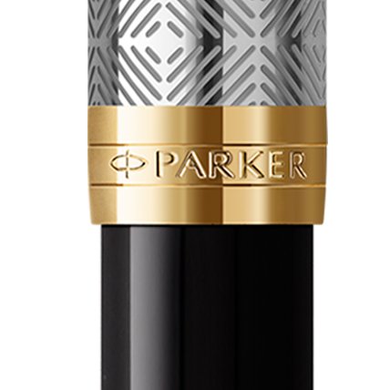 Closeup of a Sonnet barrel and pen cap with gold trim showcasing an engraved Parker logo.