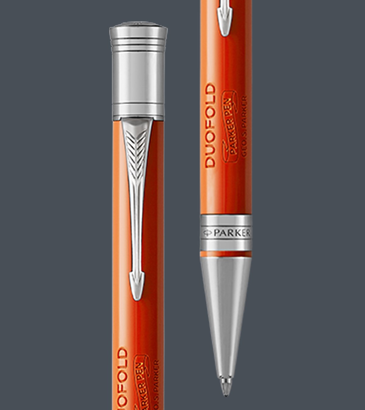 Two upright Duofold rollerball pens with chrome trim.
