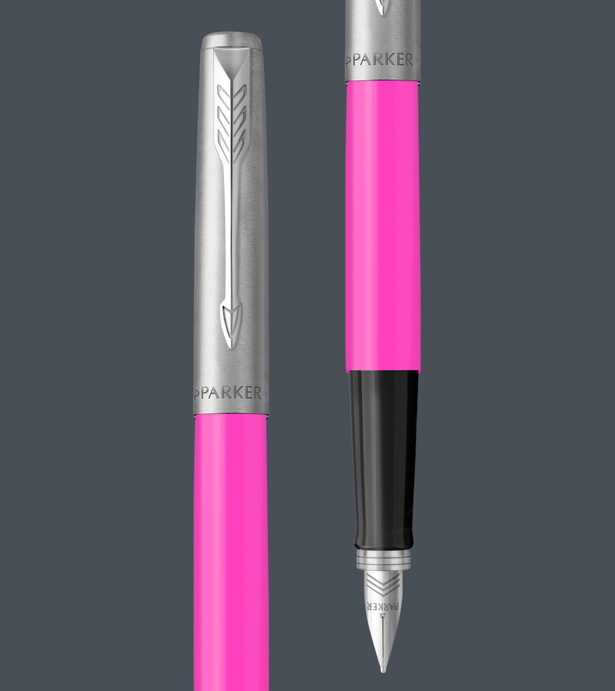 Two upright Jotter fountain pens with chrome trim.