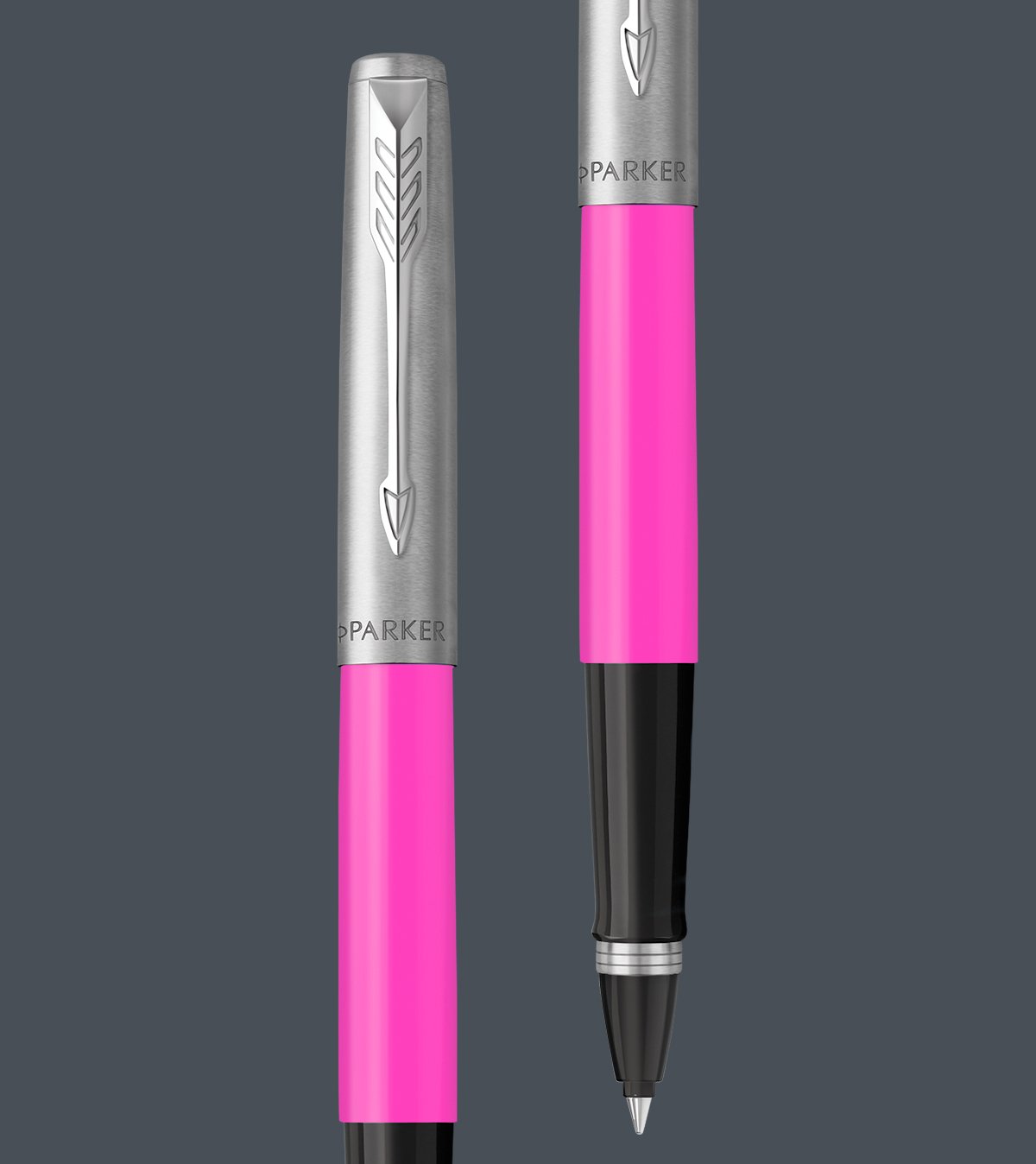 Two upright Jotter Originals rollerball pens with chrome trim.