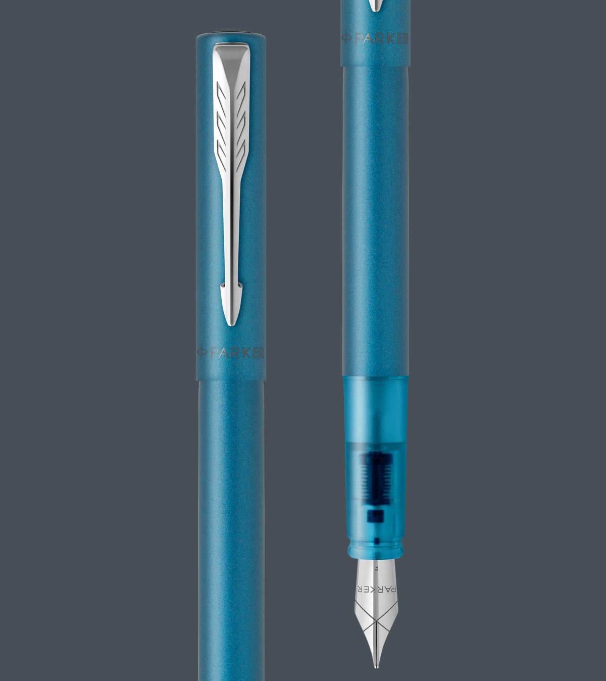 Two upright Vector fountain pens.