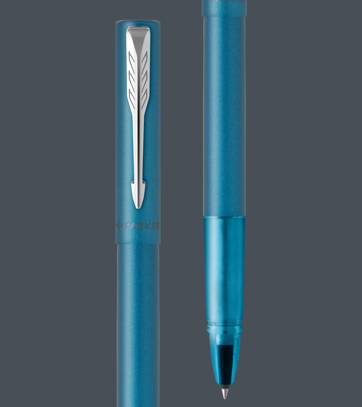 Two upright Vector rollerball pens.