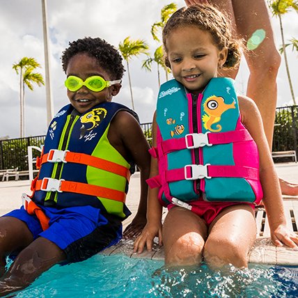 children in life jackets