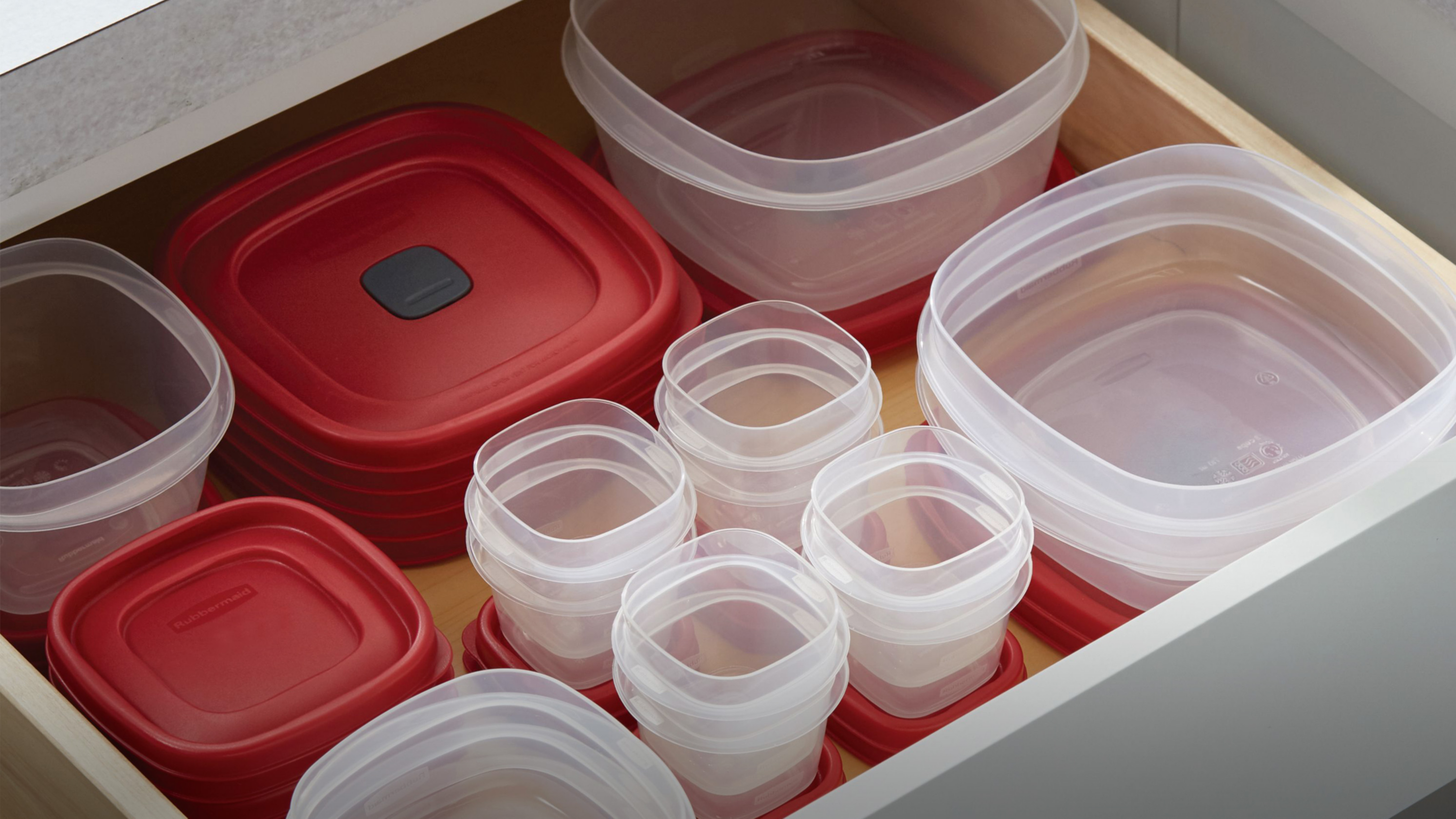 stacked and organized easy find lids containers in drawer