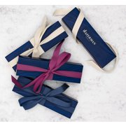 Four gift boxes with colorful bows tied onto them. image number 6