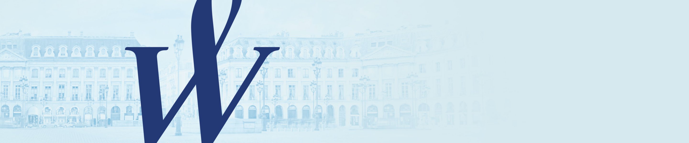The Waterman looped W over an illustrated background of Parisian buildings.