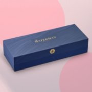 A closed gift box over a colorful background. image number 6