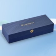 A closed gift box over a colorful background. image number 7