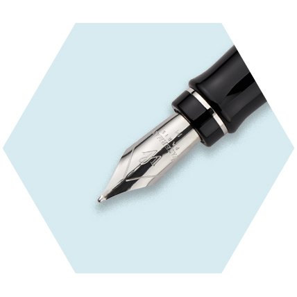 Closeup of an Expert fountain pen nib in a hexagon.