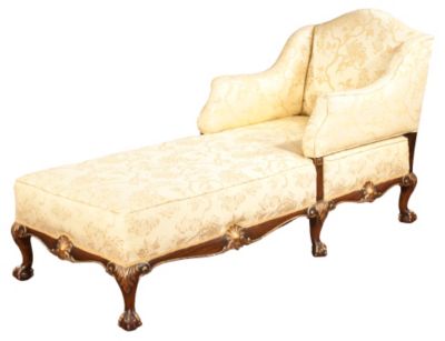 A fully upholstered mahogany Chippendale-style daybed.