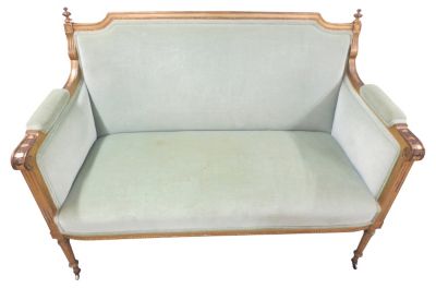 The soft palette of the Neoclassical era on an American Federal-style settee.