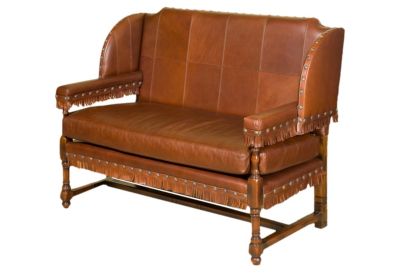 The first fully upholstered sofa, The Knole Settee.