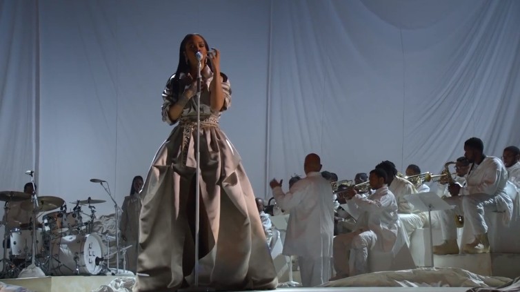 Rihanna Performs in Front of Rip Stop Curtains