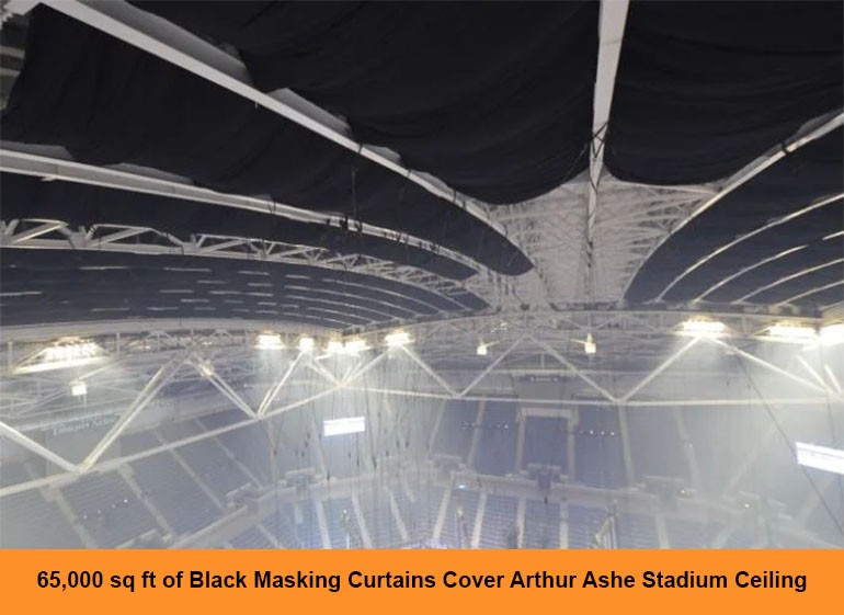 black curtains covering ceiling panels of Arthur Ashe Stadium to block natural light