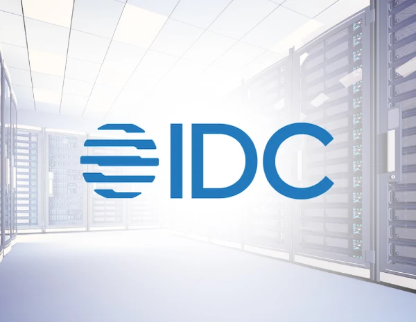 IDC logo over data center stacks with Solidigm QLC drives 