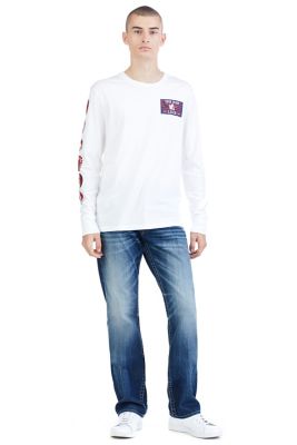 white true religion jeans with red stitching