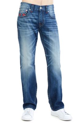 white and red true religion jeans